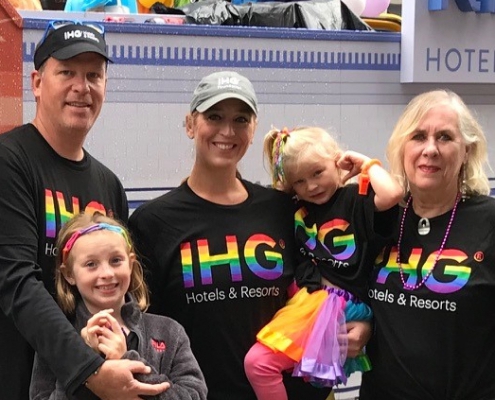 Danielle Derkink (center) with her family at the Atlanta Pride Parade.